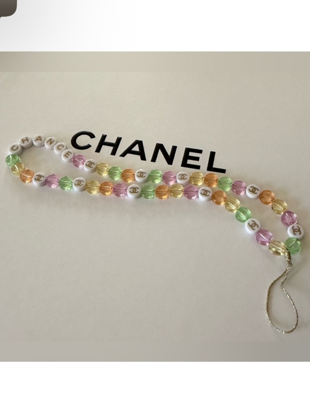 CHANEL Pastel Multicolor Beaded Phone Strap with Logo Beads